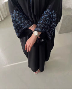 : عبايات abaya