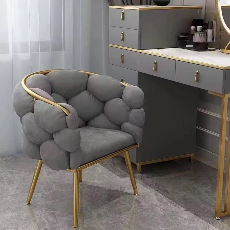 Velvet chair with golden legs