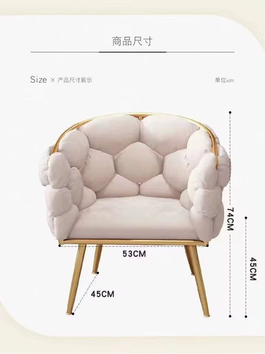 Velvet chair with golden legs