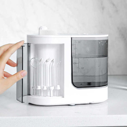 خيط تنظيف الأسنان بالماء مستلزمات حمام